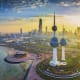 Kuwait City skyline at sunset with the Kuwait Towers landmark in the foreground and the Arabian Gulf coastline